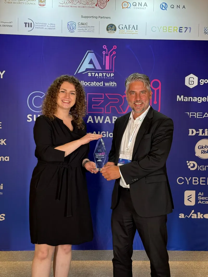 plugnpl.ai team receiving a startup award